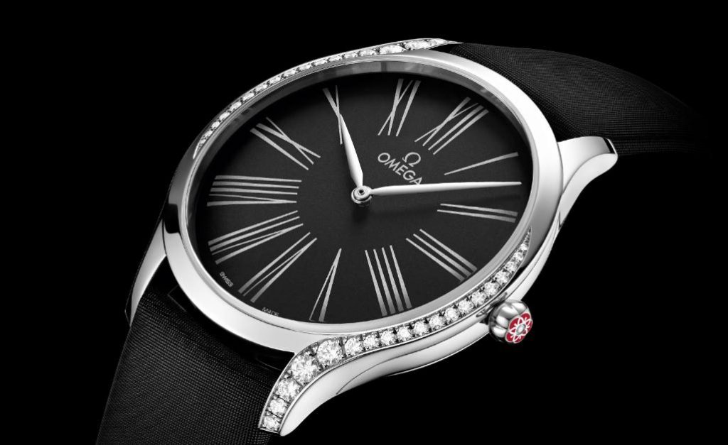 The female copy Omega De Ville Tresor watches are decorated with diamonds.